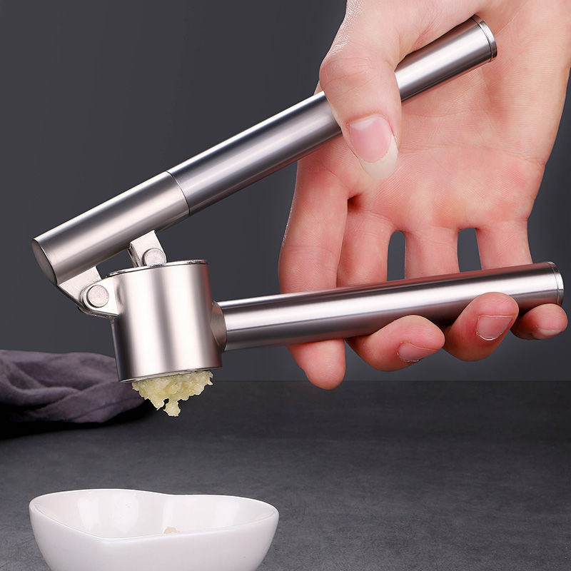 Kitchen Garlic Press with Soft;  Easy to Squeeze Ergonomic Handle - Garlic Mincer Tool with Sturdy Design Extracts More Garlic Paste - Easy to Clean Garlic Crusher and Ginger Press (Silver)